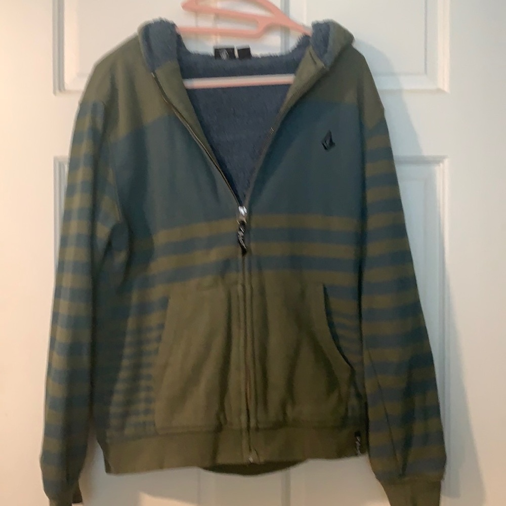 Young man Volcom zippered hoodie